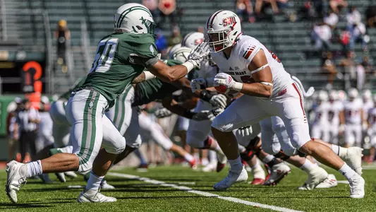 Trevon Erickson football action versus Sacred Heart