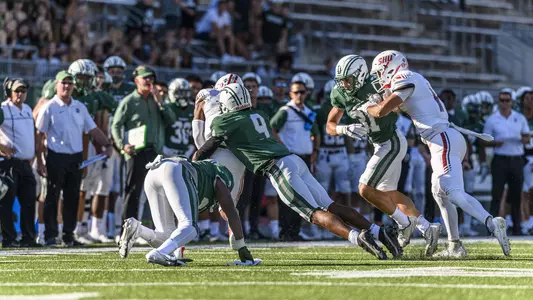 Tyson McCloud football action versus Sacred Heart