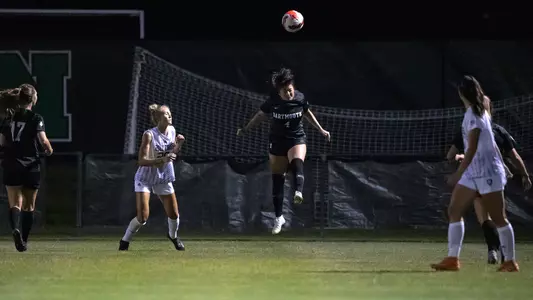 Relly Ladner soccer action versus Holy Cross