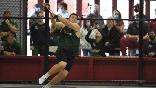 Jacob Fishler men's track competing against Harvard
