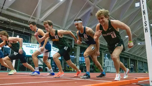 Aidan Robinson men's track action in Leverone Fieldhouse