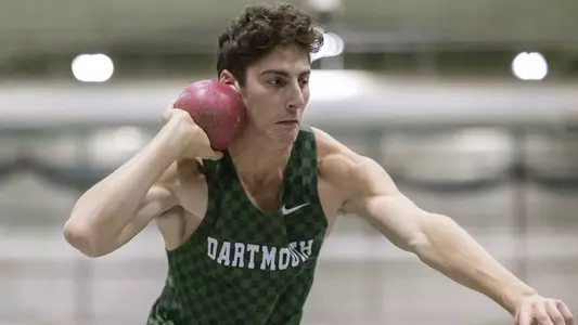 Ethan Hughes men's track action in Leverone Fieldhouse