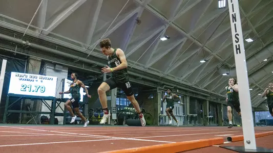 Nils Wildberg men's track action in Leverone Fieldhouse