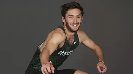 DJ Matusz men's track posed action