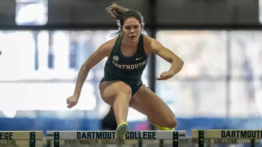 Daniela Ruelas Lomeli running the hurdles