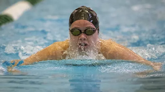 Julianne Jones women's swim action versus Harvard and Cornell