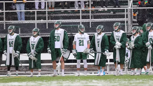 Bench men's lacrosse action versus Merrimack