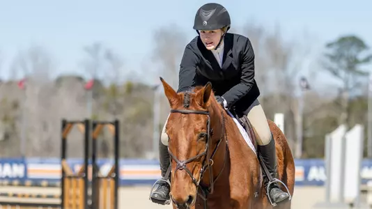 Tori Bergstein riding a horse at Auburn