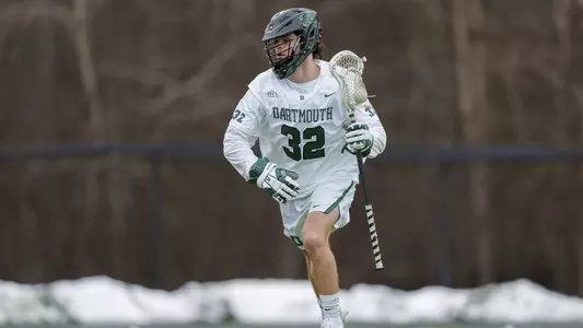 Cooper Higgins men's lacrosse action versus St. Johns