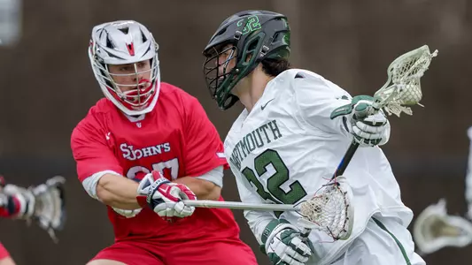 Cooper Higgins men's lacrosse action versus St. Johns