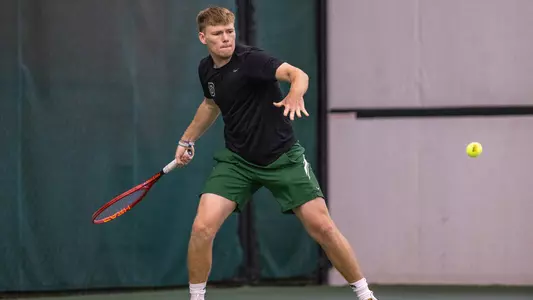 Daniel Webb Men's tennis action versus Penn