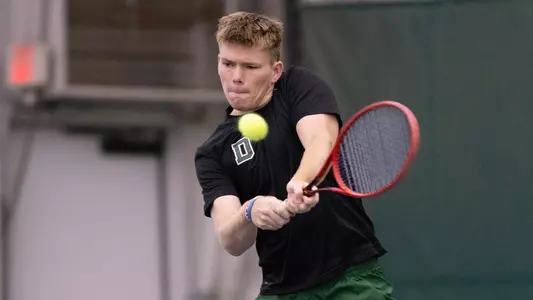 Daniel Webb Men's tennis action versus Penn