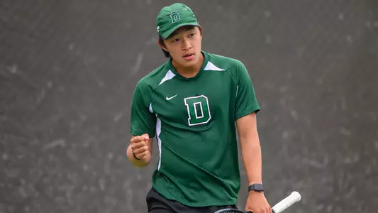 Logan Chang men's tennis action versus Brown