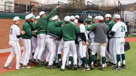 Celebration baseball action versus Brown