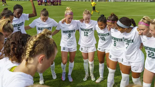Huddle women's soccer action versus Fordham
