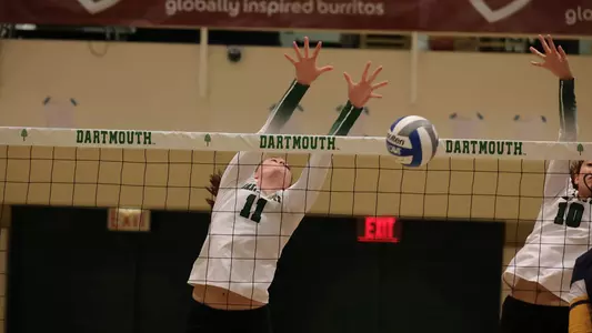 Molly Power volleyball action versus Merrimack