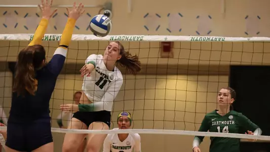 Molly Power volleyball action versus Merrimack