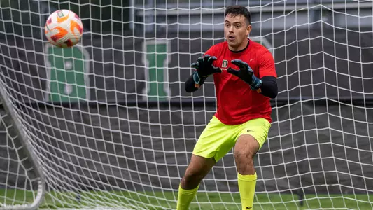 Ethan McNab men's soccer action versus UMass