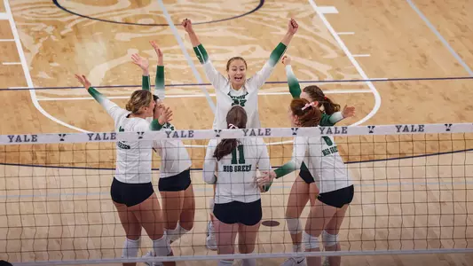 Celebration volleyball action versus Yale