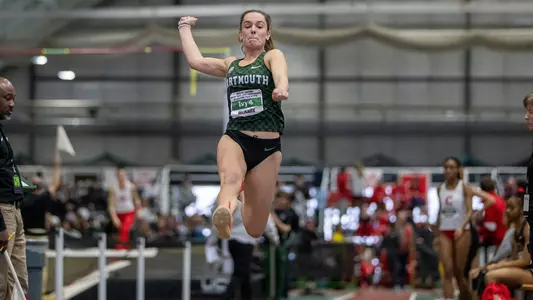 Bridget McNally long jumping on Day One of Heps championship