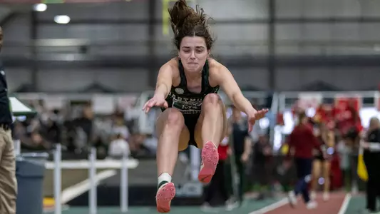 Emma Cunningham jumping on Day One of Heps championship