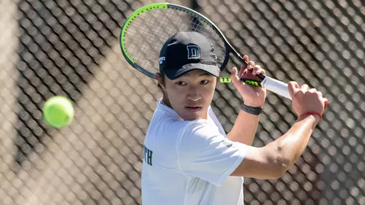 Logan Chang During Yale tennis match