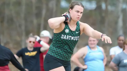 Autumn Clark competing in shot put at UConn