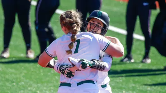 Maria Angelino hugs Kelly Beaupre