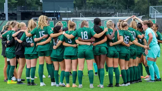 Huddle during women's soccer game vs. Eastern Michigan