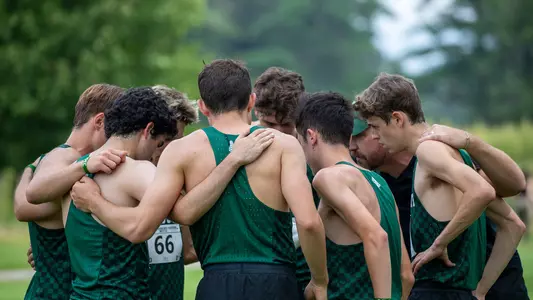 Men's Cross country huddle during Maribel Sanchez Souther Invitational