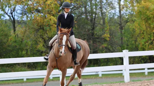 Riley Dickman competes at home