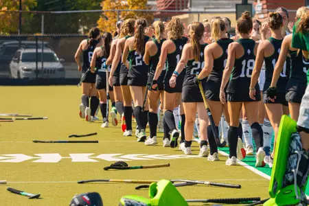 Big Green going through high five line