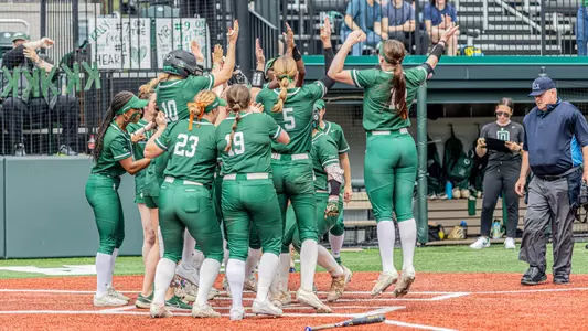 Softball celebration vs. Columbia