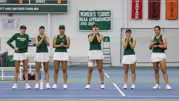 Women's tennis cheers on the team
