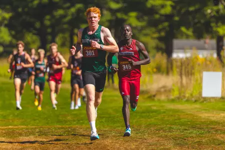 Callahan Fielder runs at Maribel Invite