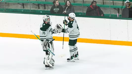 Emmett Croteau and CJ Foley after a goal