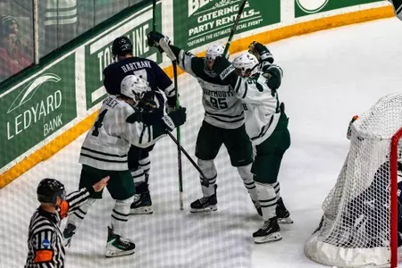 A TRIO celebrate a goal