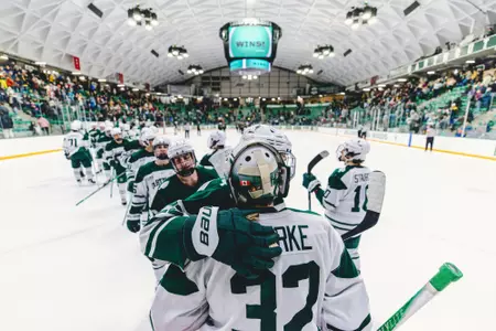 Roan Clarke gets hockey hugs after win