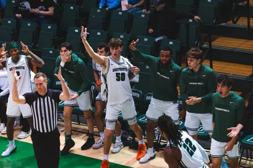 Bench cheering at the end of the game