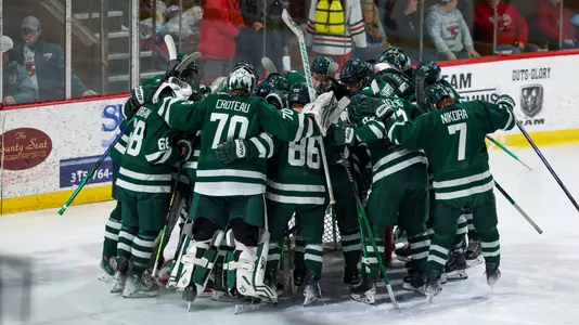 DMIH team huddle vs SLU