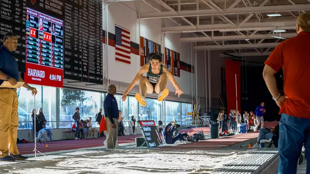 Mariella Schweitzer participates in the long jump event at the Crimson Invite