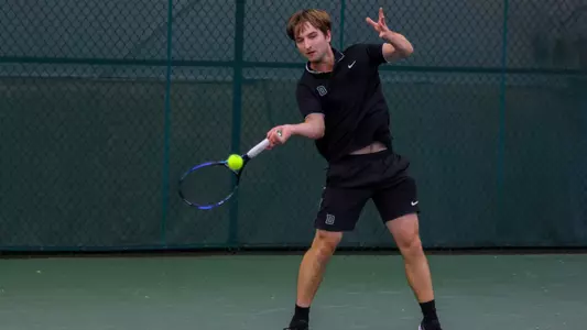 Alex Knox Jones plays tennis