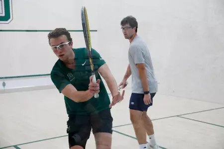 Quintin Campbell plays squash at home