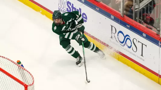 CJ Foley stops behind the net in Lake Placid