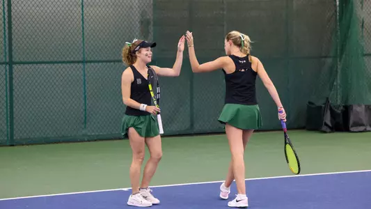 Moore and Capuano high five vs Penn