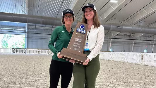 Tenley Walsh and Megan McGill pose with National Championship trophy