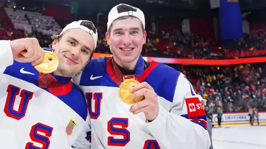 Drew O'Connor poses with Gold Medal from 2025 IIHF World Championship