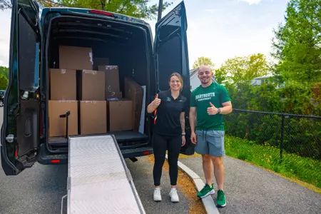 EQ Staff donates clothing