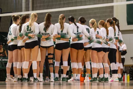 VB team huddle against Laval
