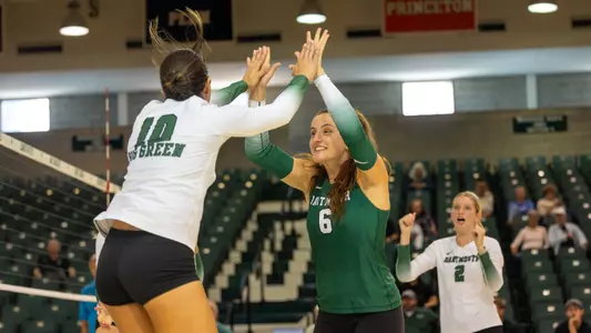 EllaMae Fitzgerald high fives Gutz